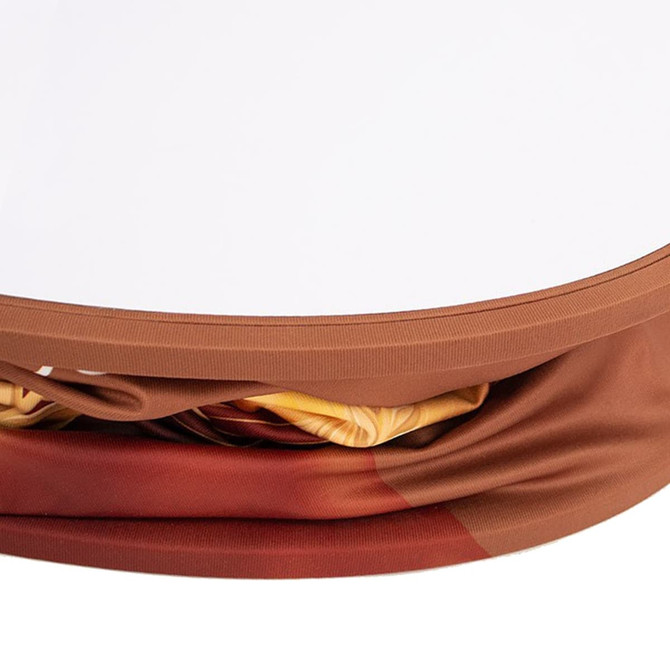 A backlit LED spring-up display with a rectangular shape, featuring a brown and orange fabric graphic.