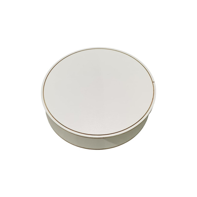 A round, backlit LED display with a sleek, white finish and a subtle gold rim. It also features a logo.