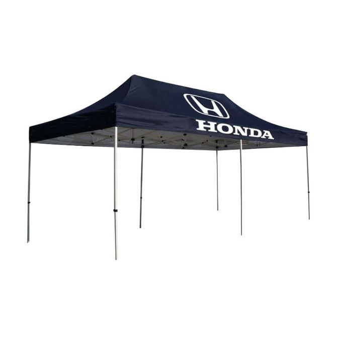 A large navy marquee tent featuring a white logo and multiple support poles.
