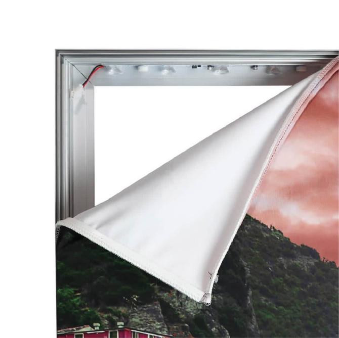 A backlit LED light box display featuring a partially removable fabric cover. The frame is silver with visible internal lights.