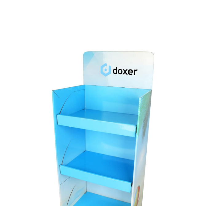 A blue cardboard floor display with three shelves and a branded header section at the top.