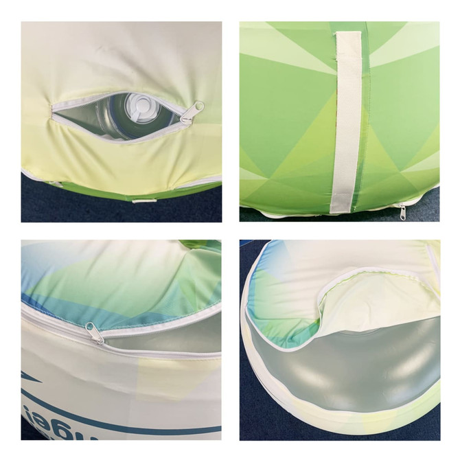 An inflatable ottoman in green and white with a drink bottle pocket and zipper detail. It has a logo or branding.