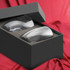 A double wall glass set in a black box, featuring two clear glasses resting on a grey inner lining.