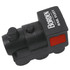 A black and red locomotive-shaped stress reliever, featuring a logo on one side.