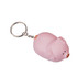 A pink pig-shaped stress reliever attached to a metal keyring. The item has a smooth texture and features a keychain.