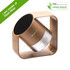 A wireless speaker with a cylindrical design in natural wood tones and a square base, featuring a logo.
