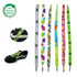 Five pairs of colourful shoe laces, featuring various patterns, with a black shoe displaying the green laces.