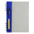 A recycled journal book with a blue cover, spiral binding, and a pen attached to the side.