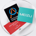A clear dish containing three vinyl stickers: one black with colourful dots, one turquoise with "MEIZU," and one red and white.
