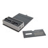 A matte black ballpoint pen inside a grey box with a card nearby, featuring a logo and elegant design.