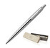 A metal ballpoint pen in brushed stainless steel, displayed beside two elegant presentation boxes, featuring a logo.