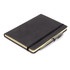 A black A5 executive notebook journal with an elastic band and a silver pen beside it.