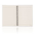 An A5 spiral-bound notebook with stone paper, featuring lined pages and a transparent cover.