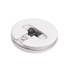 Earphones in a round white case, featuring black and white design with neatly wrapped cables inside.