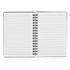 A spiral-bound A6 notebook with blank lined pages and a black cover. It features a central spiral binding.