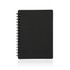 A black A6 spiral-bound notebook with a plain cover and visible spiral binding.