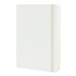 A large, white Moleskine classic hard cover notebook with an elastic band and rounded corners.