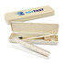 A pencil case in a light beige colour containing a ruler, pencil, sharpener, and a white pencil. It has a logo on the lid.