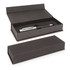 A black gift box with a magnetic closure containing a sleek pen. The box has a simple design and an internal insert.