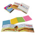 A collection of colourful combo pads in various shades, featuring different designs and a logo on some covers.