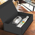 A stainless steel drink bottle and tumbler in a black gift box, featuring various logos.