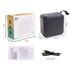A portable wireless Bluetooth speaker in black, with a square design and a USB Type-C cable and manual included.