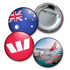 Four button badges featuring an Australian flag, a red logo, and an image of a Qantas A380, with a metallic backing.
