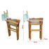 A wooden director's chair with a floral fabric seat, featuring a light blue backrest and a foldable design.