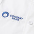 A white chef jacket with short sleeves and a double-breasted design featuring a logo and embroidered text.