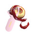 A pink vegetable peeler with a metal blade, alongside a partially peeled red apple and a long strip of apple skin.