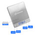 A silver rechargeable kitchen scale with a digital display, featuring buttons for various functions and a logo.