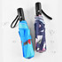 Two compact umbrellas, one in blue with a colourful design and the other in navy with a floral pattern, both with handles and branding.