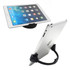 A black phone or tablet holder displaying a silver tablet, showcasing its adjustable stand design.