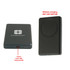 A black aluminium power bank with a wireless charging feature and a logo on its surface.