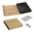 A black 20000mAh power bank with a packaging box, instruction manual, and USB cable on a light background.