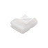 A folded white embroidered cotton hand towel sits on a flat surface. The towel has a soft texture and features a logo.