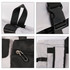 A multi-pocket roll top backpack in black and white, featuring adjustable straps and zippered compartments.