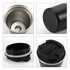 A stainless steel coffee mug in silver and black, featuring a removable lid and base, with an inner metal compartment.