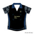 A women's open neck polo shirt in black and blue with a patterned design and a logo space.