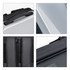 A grey expandable hardshell backpack features a sturdy handle, padded straps, and textured surfaces. It has a logo as well.
