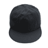 A giant black baseball cap with a flat brim and a structured crown. It features a logo on the front.