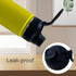 A drink bottle in vibrant yellow with a black lid and carry handle, featuring a leak-proof design.