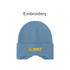 A blue earflap beanie with a ribbed texture and yellow embroidery. Features a logo on the front.