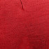 A red textured fabric featuring a knitted pattern, suitable for making beanies. The image includes a branding logo.