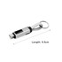 A 100W 3-In-1 aluminium charging cable in silver with a digital display and attached keyring.
