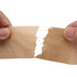 A person holds two pieces of water-activated reinforced kraft paper tape, displaying its brown colour and textured surface.
