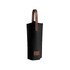 A drink bottle in a black felt wine bag with a brown leather handle and accent.
