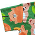 A hooded towel poncho featuring a playful bear pattern on a green background with leaves.