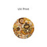 A round ceramic coaster featuring a vibrant design in orange, yellow, and brown tones, with intricate floral patterns.