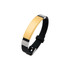 A metal bracelet with a shiny gold centrepiece and a black silicone band, featuring silver accents.